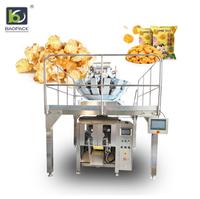 Ensacheuse verticale automatique à 14 têtes avec pesage pour aliments soufflés à l'azote (popcorn, chips, snacks à la banane) en sachets film ou papier