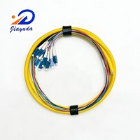 Arnés de Fibra Óptica de Grado Operativo de 12 Fibras SM G.652D G.657A1 G.657A2 con Codificación Multicolor y Cubierta Exterior Amarilla LC SC ST FC Select