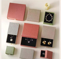 Coffret de collection de luxe personnalisé Seismo noir avec LED, comprenant boutons de manchette, clous de chemise, pièces de monnaie, cartes souvenirs, bougies, emballages rigides recyclables