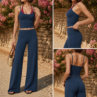 Nouveautés : Ensemble 2 pièces bicolore avec soutien-gorge de sport dos nu superposé et pantalon de yoga taille haute à jambes larges, en tissu brossé extensible dans les quatre sens