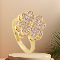 Bague géométrique rotative à feuilles de fleurs, version coréenne, très tendance, design de niche féminin, plaqué or haut de gamme, cuivre, pierre naturelle