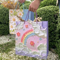 Sac fourre-tout de luxe OEM/ODM en papier blanc recyclable, sûr pour les aliments, avec pelliculage mat, design haut de gamme, motif peinture à l'huile, poignée longue