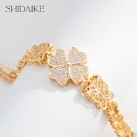 Bracelet tennis pour femme, design floral unique avec zircon taille princesse, en alliage de cuivre plaqué or 18 carats, bijou tendance pour soirée