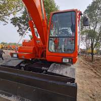 Corée du Sud – Excavatrice sur pneus d'occasion DAEWOO Doosan Dx140W/150W DH150-7/Dh150LC-7/150W-7, 15 tonnes, moteur 110KW, 2001-4000 heures d'utilisation