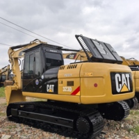 Excavatrice CAT 323D d'occasion de 23 tonnes en bon état pour travaux de terrassement en montagne, construction de logements et gros travaux de terrassement
