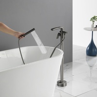 Robinet de baignoire autoportant en laiton gris anthracite avec bec cascade et douchette à main