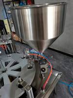 Machine de remplissage et de scellage rotative automatique haute performance Hongyi HY-1062 pour emballages en papier d'aluminium de crème glacée et de yaourt