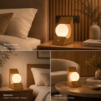 Lampe de table globe rechargeable sans fil à finition grain de bois, style moderne et naturel, idéale pour hôtel boutique et chambre à coucher