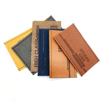 Accessoires vestimentaires : Étiquettes personnalisées avec logo, étiquettes en jacron pour jeans, étiquettes en cuir gaufré pour chapeaux et sacs, patchs en cuir PU