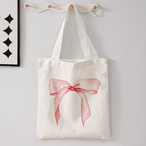 Sacs fourre-tout en toile épaisse de 16 oz, réutilisables, en coton, style minimaliste, avec nœud rose festif et longue bandoulière, pour la vente en gros - Product Image 3