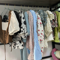 Vêtements pour femmes haut de gamme à une épaule, manches longues, en balles de gros
