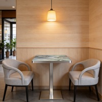 Ensemble table et chaises de café, plateau en pierre frittée, pieds en métal, mobilier pour restaurants, hôtels, style luxe léger et contemporain