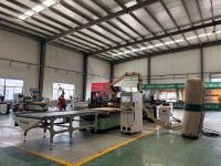 Machine de travail du bois CNC intelligente avec chargement automatique, routeur CNC, étiquetage automatique, ligne de production de meubles en panneaux