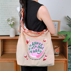 Nouveauté : Sac à cordon en nylon brodé sur toute la surface, imperméable et écologique – Sac polyvalent tendance de taille moyenne à grande - Product Image 1