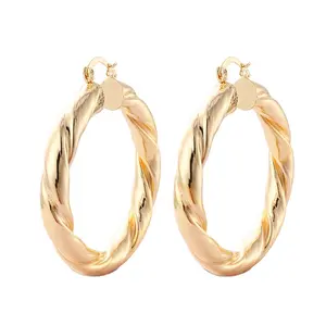 Wholesale Women Fashion Fancy Design Gold Twisted Hoop Earrings