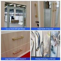 Armoire de luxe en acier imprimé avec miroir tactile et 4 portes métalliques, dotée d'un tiroir, pour chambre à coucher et mobilier de maison