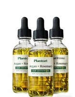 Huiles végétales naturelles de marque privée pour femmes noires africaines et sérum de repousse à la biotine pour l'huile de croissance capillaire au romarin et au chebe