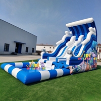 Toboggan aquatique gonflable géant commercial en PVC robuste avec grande piscine à éclaboussures pour la location d'événements estivaux