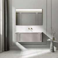 Meuble-lavabo de salle de bain en MDF courbé de style français avec miroir rétroéclairé par LED, quincaillerie en cuivre doré, lavabo en céramique intégré, salle de bain de luxe