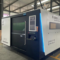 Machine de découpe laser à fibre à plateforme d'échange entièrement fermée 1500W 20000W avec table électrique 3000x1500 2000x4000 pour acier inoxydable, acier au carbone et aluminium