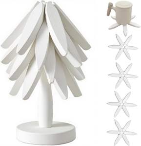 Ensemble <span class=keywords><strong>de</strong></span> <span class=keywords><strong>dessous</strong></span>-<span class=keywords><strong>de</strong></span>-<span class=keywords><strong>plat</strong></span> pliables en bois <span class=keywords><strong>de</strong></span> noyer noir naturel - 4 <span class=keywords><strong>dessous</strong></span>-<span class=keywords><strong>de</strong></span>-<span class=keywords><strong>plat</strong></span> + 1 support pour plats chauds, casseroles, bols, théières (Blanc) - Product Image 1