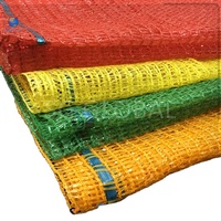 Geventileerde 5kg 10kg 25kg rode groene oranje groente- en fruitverpakkingsplastic zakken
