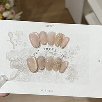 Faux ongles de luxe haut de gamme faits à la main, effet œil de chat nude, avec trèfle doré, forme ovale moyenne, réutilisables, logo personnalisé, vente en gros