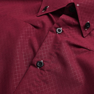 Camisa de algodón antiarrugas de talla grande 100% de manga larga con botones de color sólido informal de fábrica OEM de nuevo diseño para hombre - Product Image 4