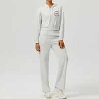 Ensemble de survêtement 2 pièces pour femme avec logo personnalisé, comprenant un sweat à capuche court zippé doux et respirant et un pantalon de survêtement évasé taille haute tendance