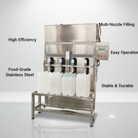 Dispositif de remplissage semi-automatique à quatre têtes pour liquides, structure haute efficacité pour ligne de conditionnement d'eau minérale et de boissons gazeuses