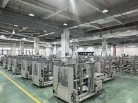 Machine d'emballage automatique pneumatique pour ouverture et formation de boîtes – Solution économique pour ligne d'emballage de cartons
