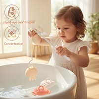 Jouet éducatif Montessori en silicone souple en forme de poisson avec ventouse pour baignoire, pour bébés de 0 à 24 mois, développement sensoriel précoce