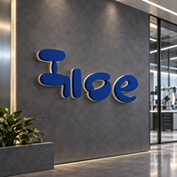 Lettres rétroéclairées en acier inoxydable bleu mat de précision avec halo blanc neutre, logo personnalisé pour l'entrée du laboratoire de robotique