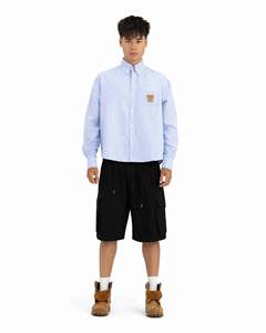 เสื้อเชิ้ตอ็อกซ์ฟอร์ดสีน้ำเงินเข้มทรงปกติ ดีไซน์อเนกประสงค์ในโทนสีน้ำเงินเด่นชื่อเสียง พร้อมโลโก้หนังนูนและลายปักด้านหลัง - Product Image 6