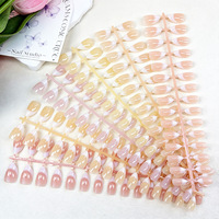Faux ongles courts à presser, forme French demi-lune œil de chat, couleur unie nude poudré, effet illuminateur, chic, vente en gros, ongles finis
