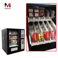 Distributeur automatique de mini-snacks, boissons et préservatifs avec accepteur de pièces, lecteur de billets et de cartes de crédit MDB/DEX