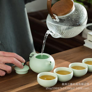 Juego de té portátil Ding Kiln, juego de té Kung Fu de cerámica con tetera y cuatro tazas, regalo de viaje, juego completo, forma redonda - Product Image 4