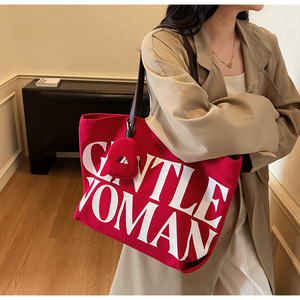 Bolsa de Hombro Casual de Gran Capacidad para Mujer, Bolso Tote Versátil de Lona con Letras para Estudiantes, Viajes Diarios, Mamás, Compras o Uso Diario - Product Image 1