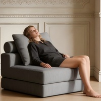 Canapé-lit pliant compact et moderne sans structure avec dossier, confortable pour petit appartement ou chambre d'amis