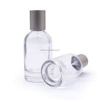 Flacon de parfum jetable rond en verre et aluminium de 30 ml, 50 ml, 100 ml avec pompe pulvérisatrice grise et emballage – Offre Spéciale
