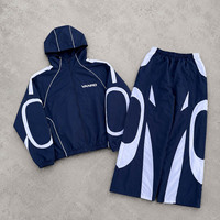 Ensemble de survêtement sportif pour homme YM Custom Manufacturers en nylon, avec logo imprimé, veste coupe-vent respirante et pantalon de jogging pour homme