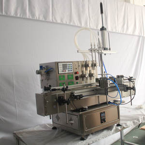 เครื่องบรรจุของเหลวแบบแม่เหล็กอัตโนมัติสี่หัว  ทำจากสแตนเลส 316 ความแม่นยำสูง สำหรับบรรจุขวดน้ำและของเหลว - Product Image 2