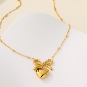 Magnifique collier avec pendentif cœur plaqué or 18 carats PVD, perles en acier inoxydable ultra-fines, chaîne à maillons, nœud d'amour, collier cœur. - Product Image 6