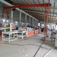 Ligne de production d'extrusion de cadres de porte en WPC d'occasion, machine de fabrication de profilés hautement automatisée avec système à double vis