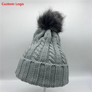 Vendita calda Pom om Beanie Logo personalizzato cappello pianura cappello caldo con pelliccia Pom donna Beanie cappelli lavorati a maglia invernali personalizzati