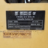 Compacteur routier Caterpillar d'occasion à entraînement hydrostatique, haute force de vibration, disponible à l'exportation