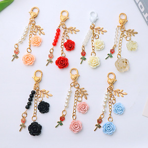 Stile moda in resina con ciondolo a forma di cammello portachiavi con ciondolo a forma di fiore per cuffia borsa Charm camelia KerRing accessori portachiavi - Product Image 1