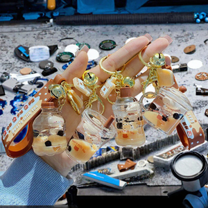 พวงกุญแจอะคริลิคใสแบบขวดทรายไหลรูปหมีน้อยลอยน้ำในชานมไข่มุก ของขวัญสำหรับผู้หญิงและคู่<span class=keywords><strong>รัก</strong></span> ใช้เป็นพวงกุญแจหรือห้อยกระเป๋า - Product Image 2