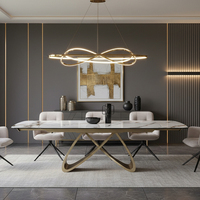 Table à manger rectangulaire extensible en pierre frittée avec base dorée au design italien moderne, livraison en 15 jours