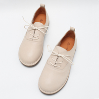 Chaussures plates décontractées pour femmes en cuir véritable, légères et confortables, avec semelle en caoutchouc